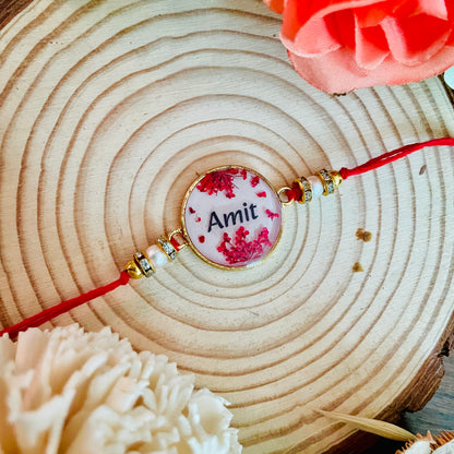 Red Name Rakhi with Real Lace Flower