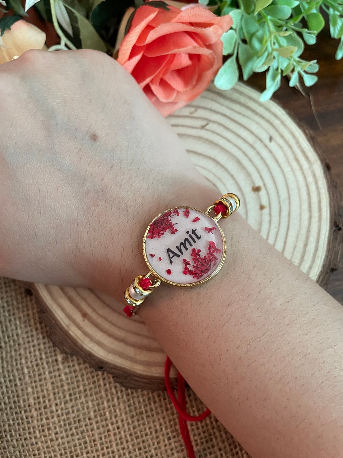 Red Name Rakhi with Real Lace Flower