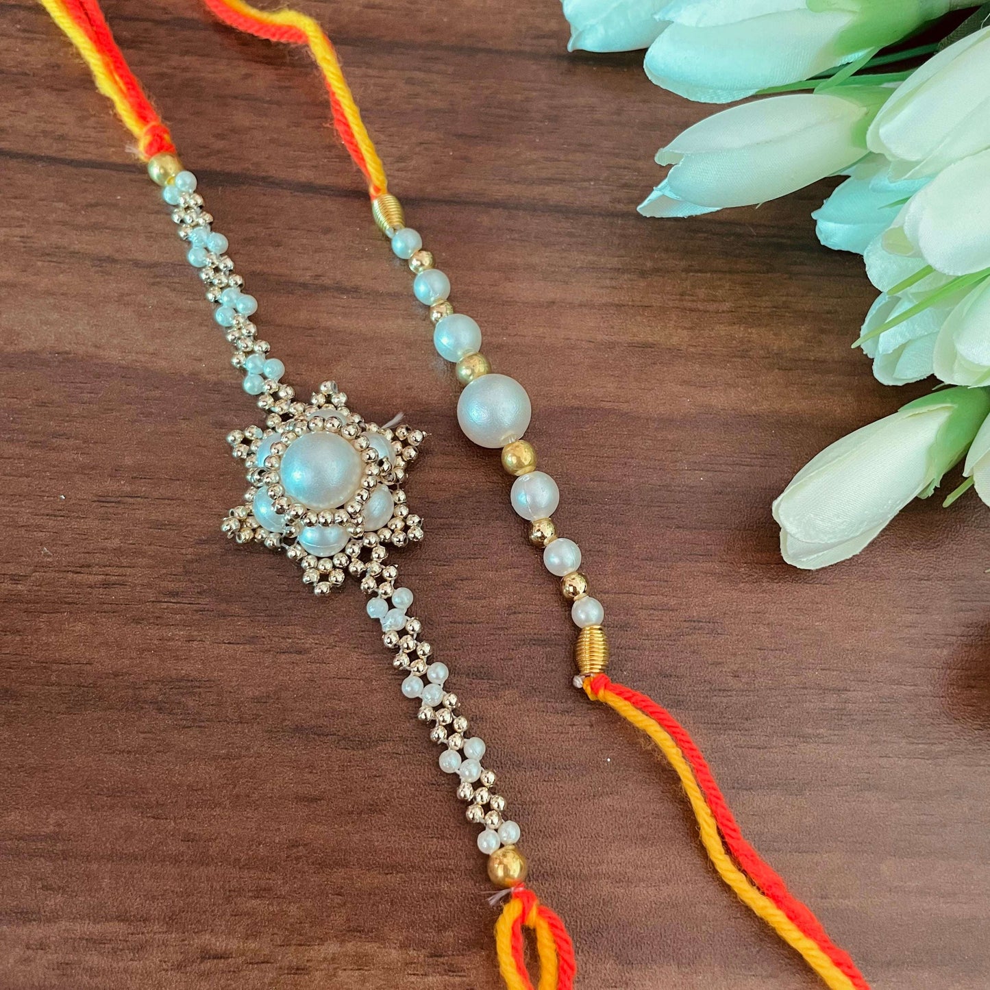 White Floral Bhai Rakhi - beattrangi
