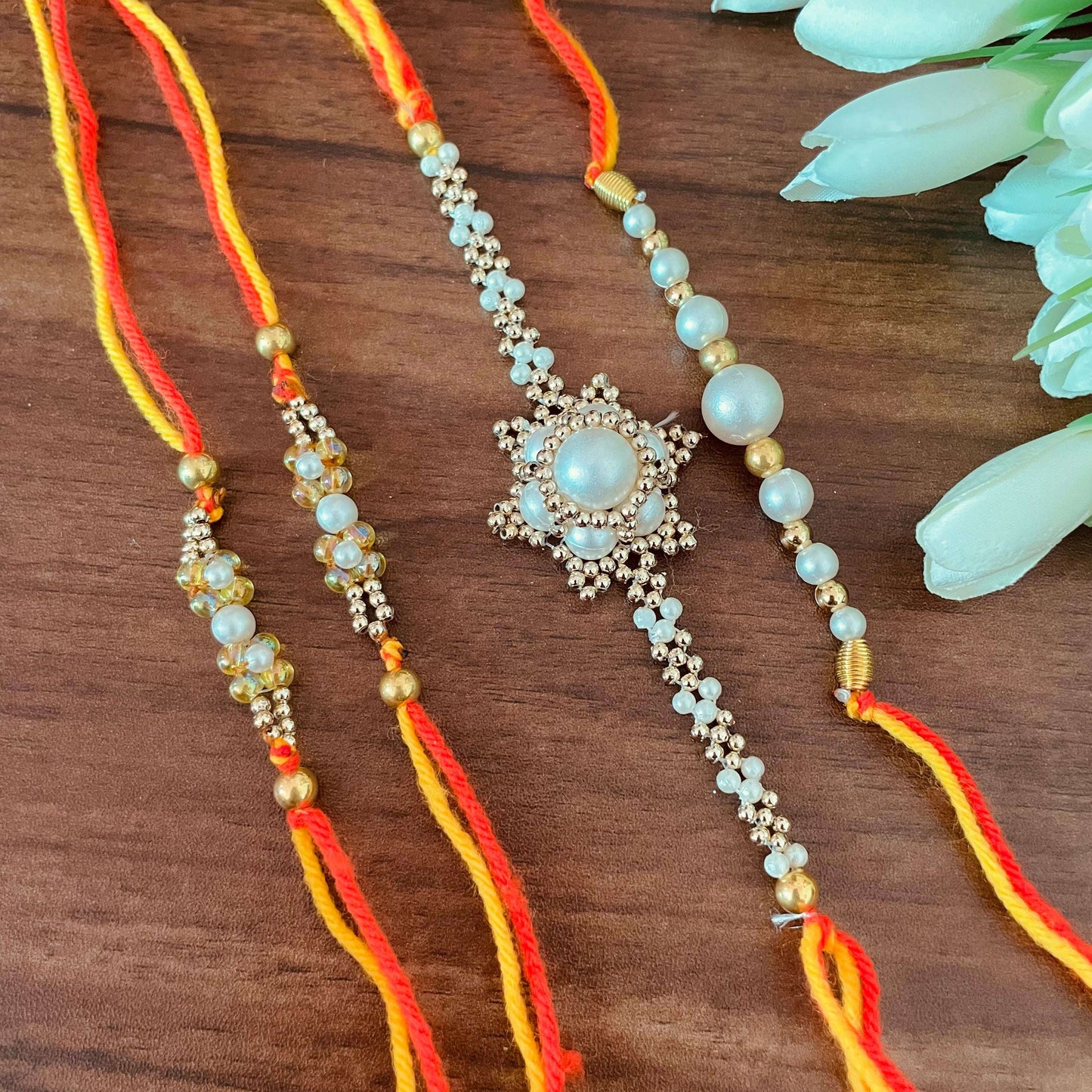 White Floral Bhai Rakhi - beattrangi