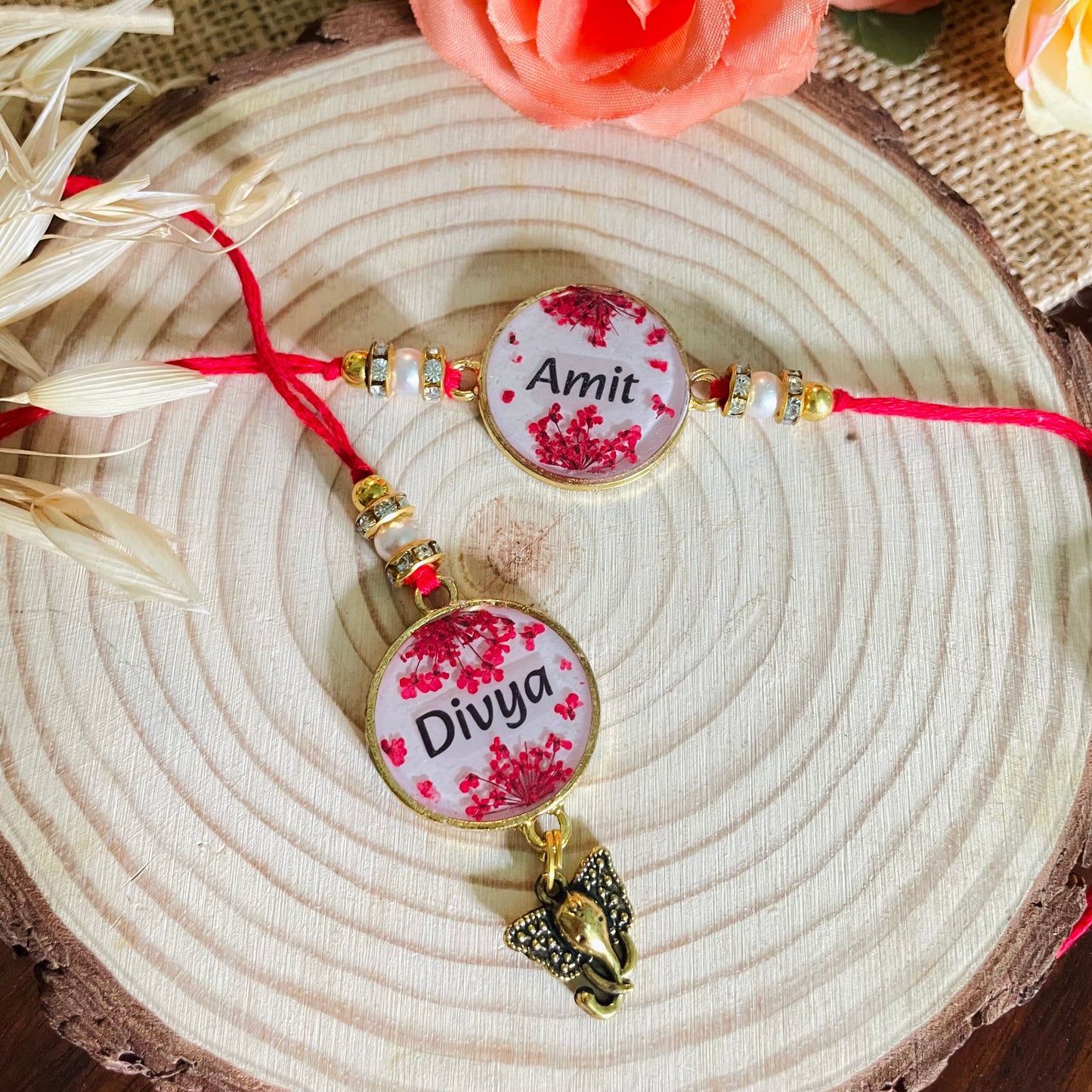 Red Name Rakhi with Real Lace Flower